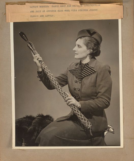 Woman posed holding a cable grip.